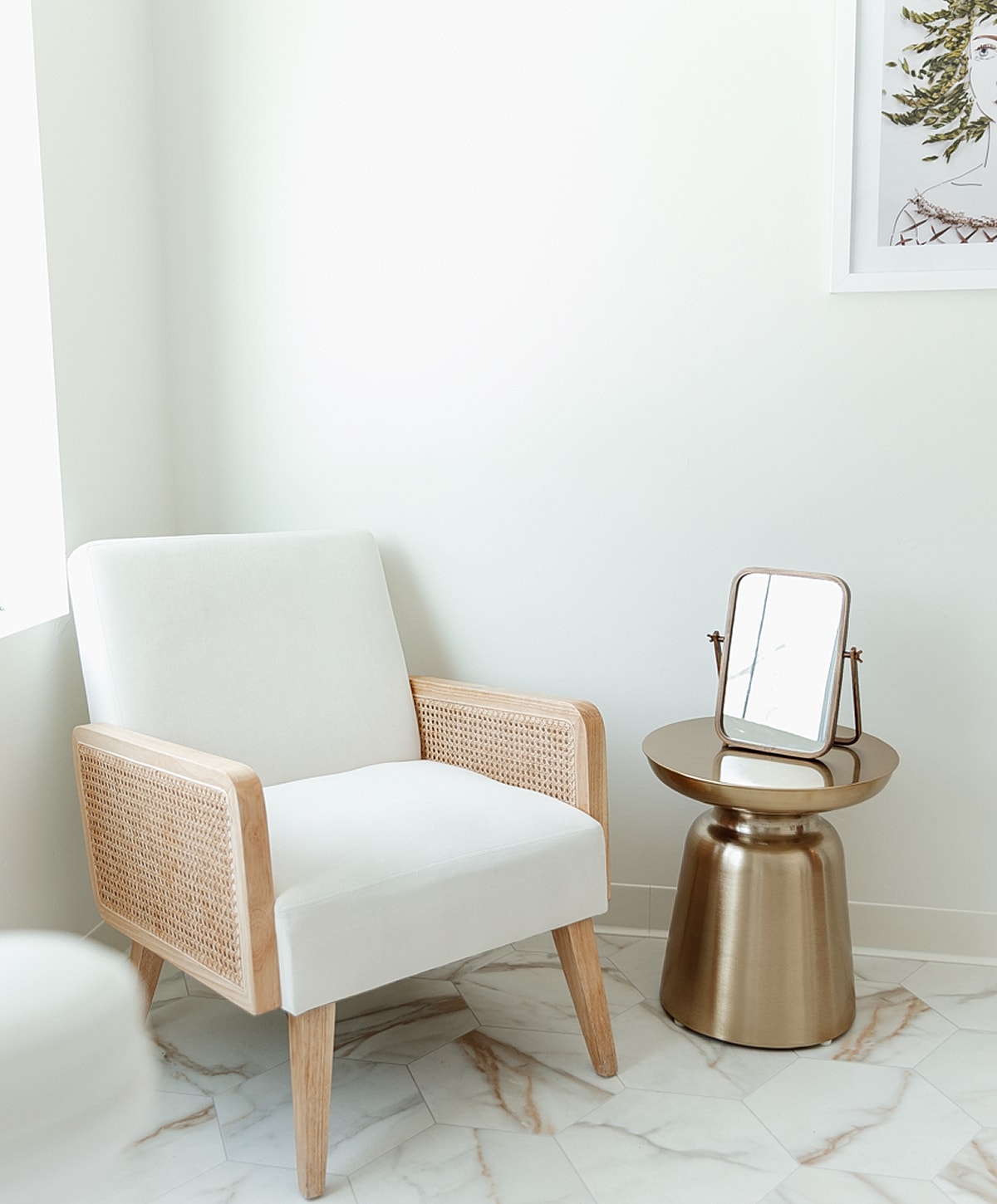 Modern chair and round side table arrangement.