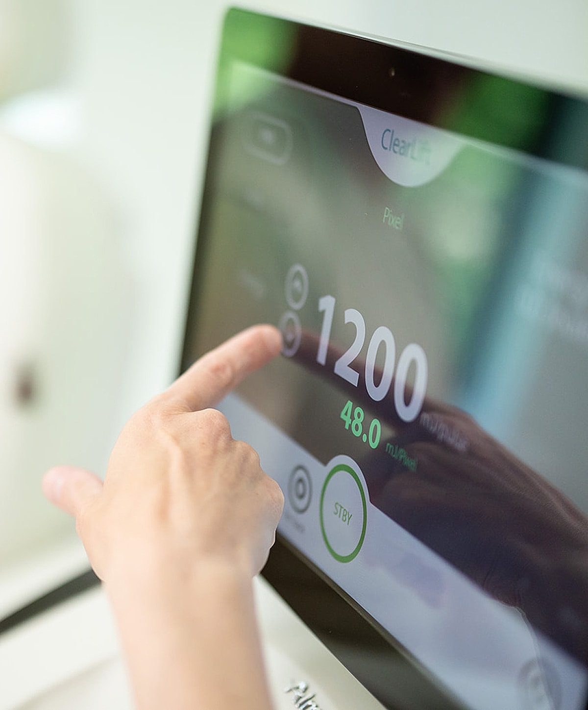 User adjusting settings on a touchscreen device.