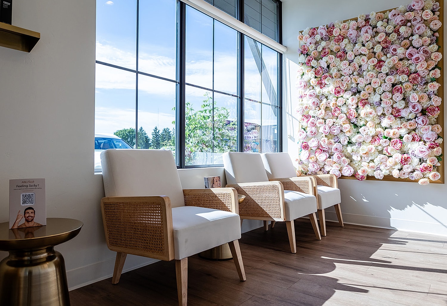Bright waiting area with floral wall decor.