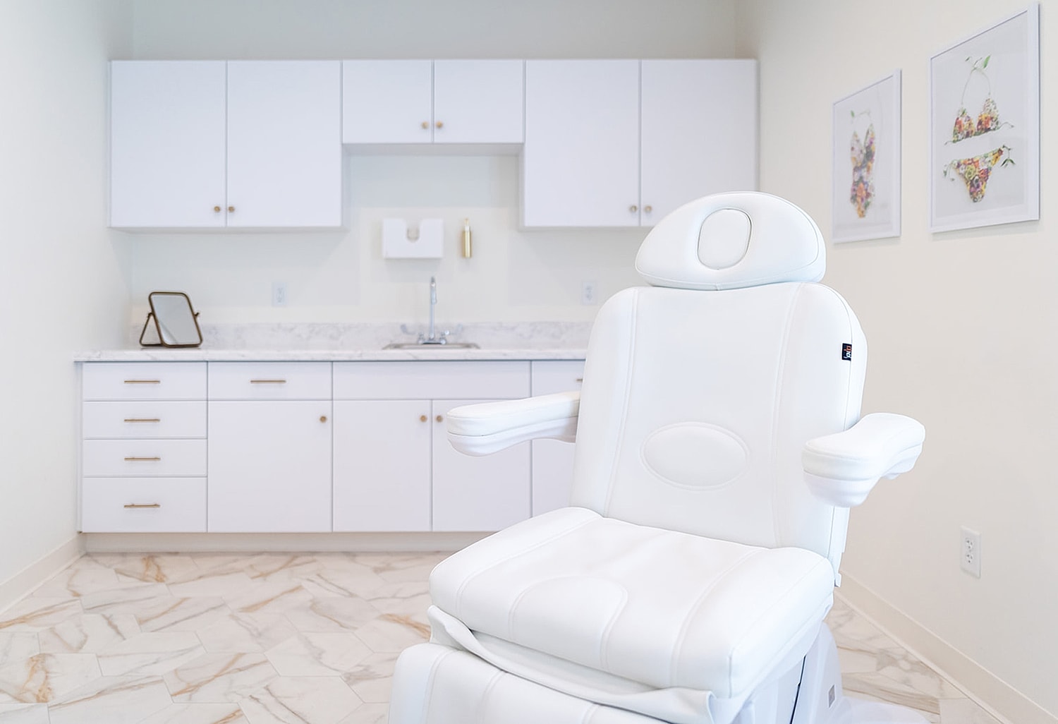 White medical exam chair in a clean room.