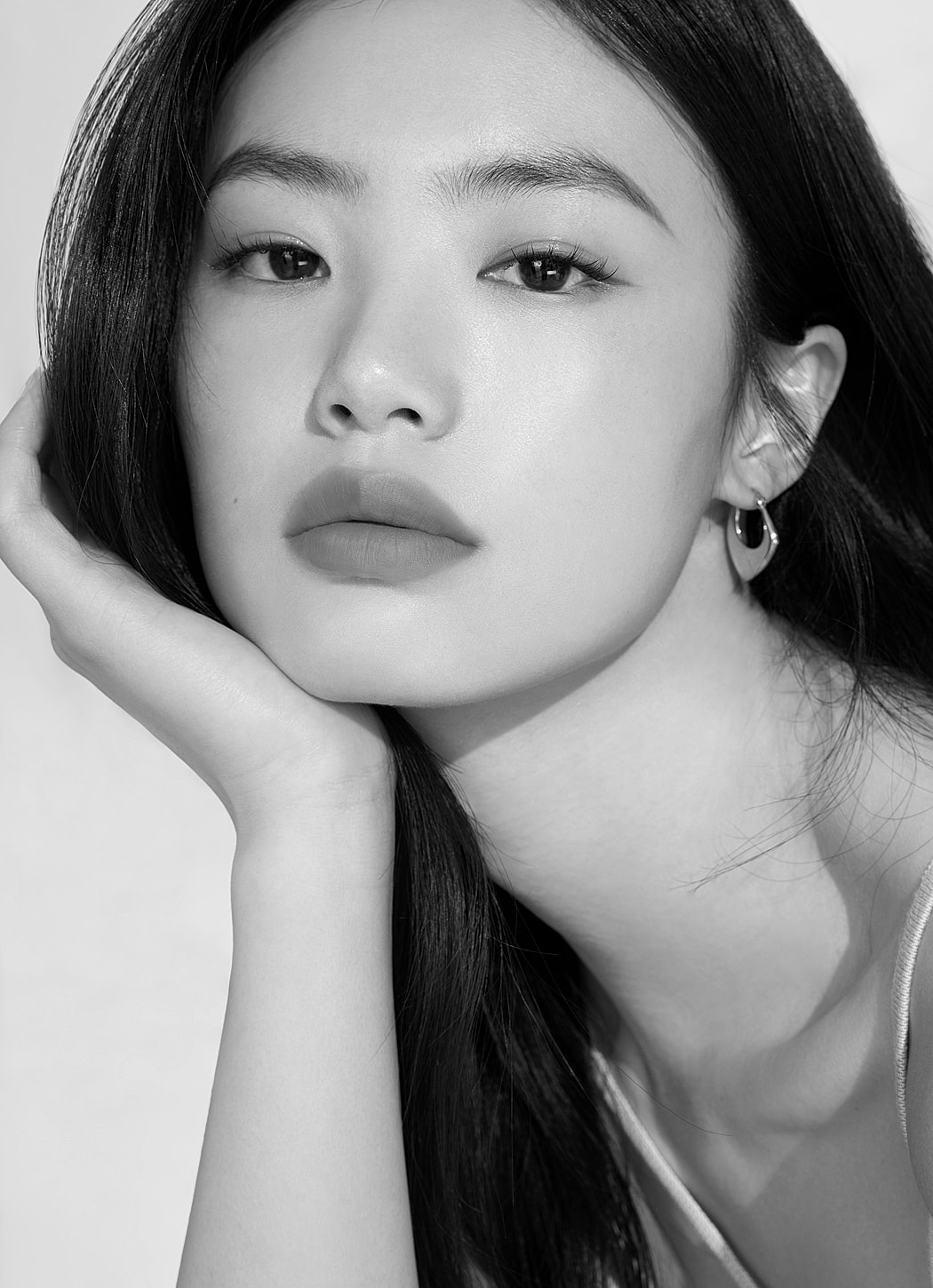 Black and white portrait of a young woman.