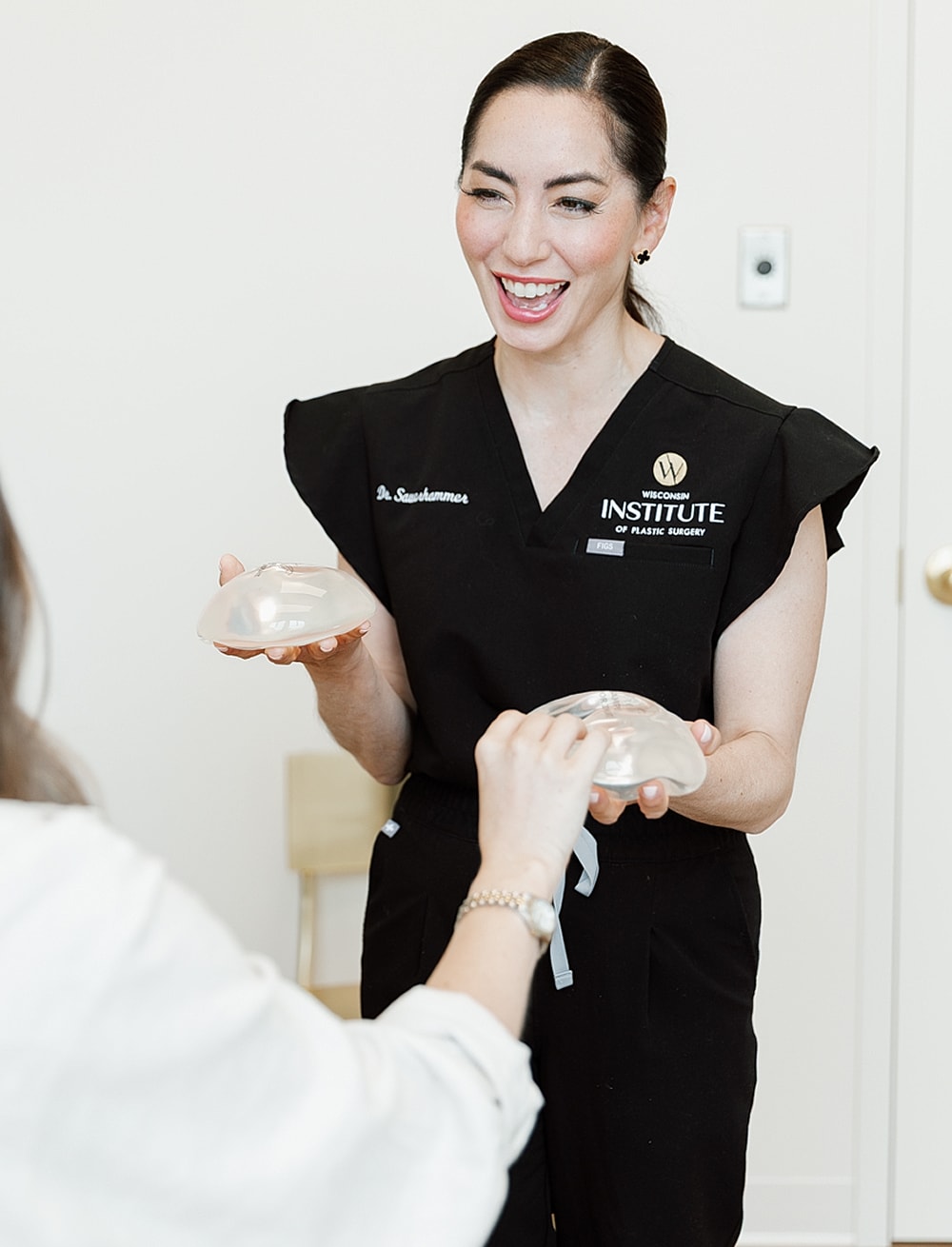 Consultation on breast implant options with doctor.