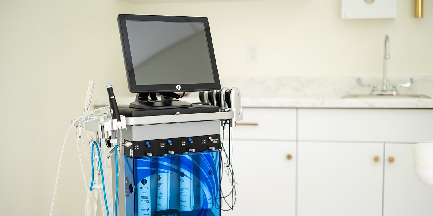 Medical equipment with monitor in a clinical setting.