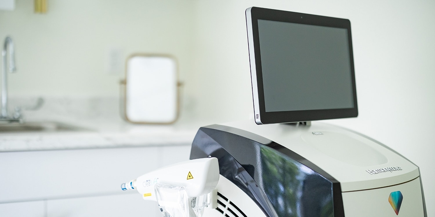 Medical aesthetic device with touchscreen interface.