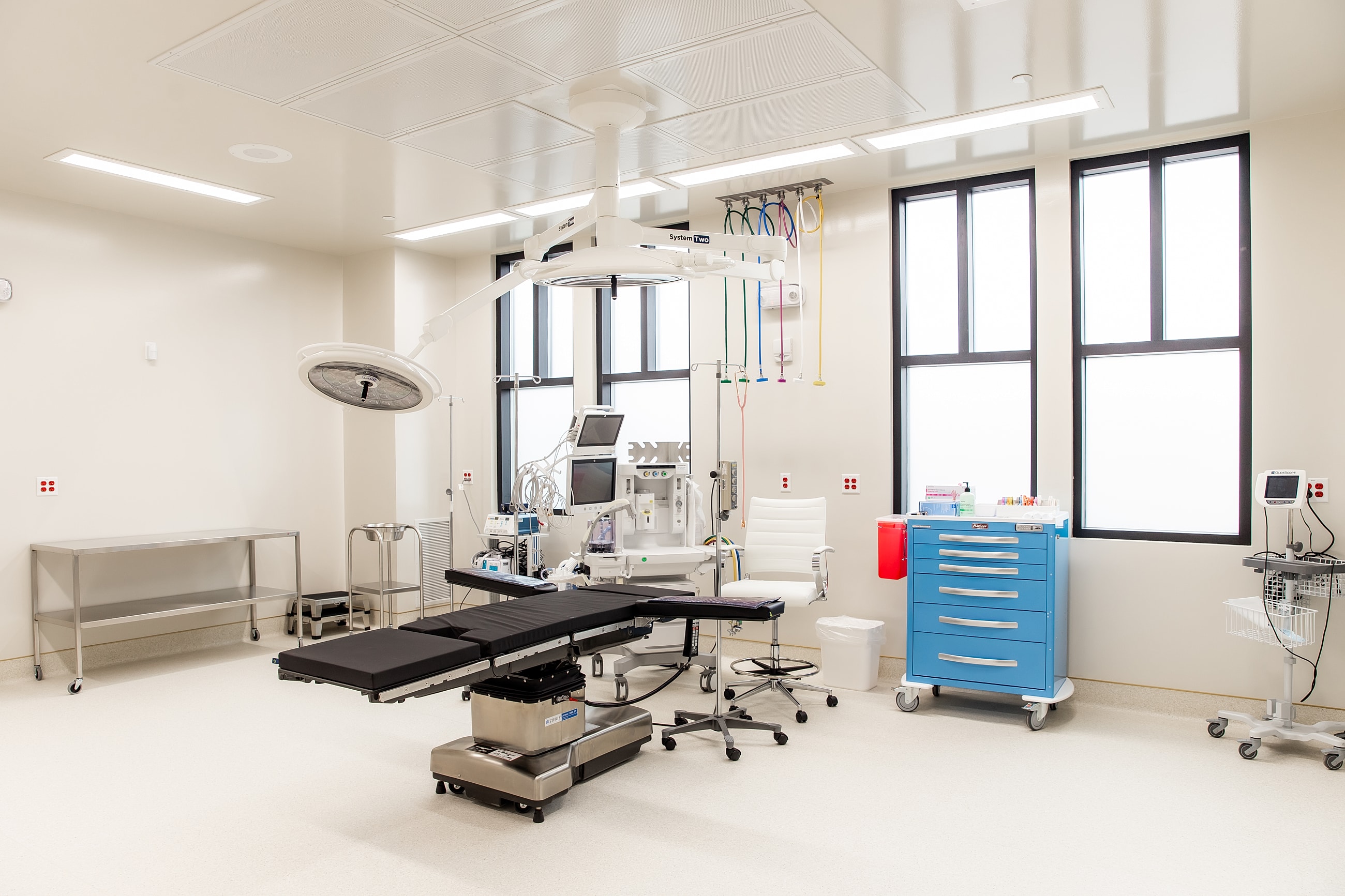 Modern surgical operating room with medical equipment